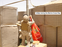 1st Sgt raising the Marine flag_r
